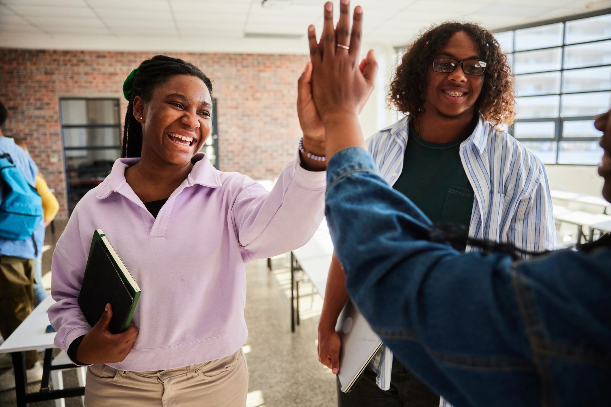 Students celebrating achievement and mentorship